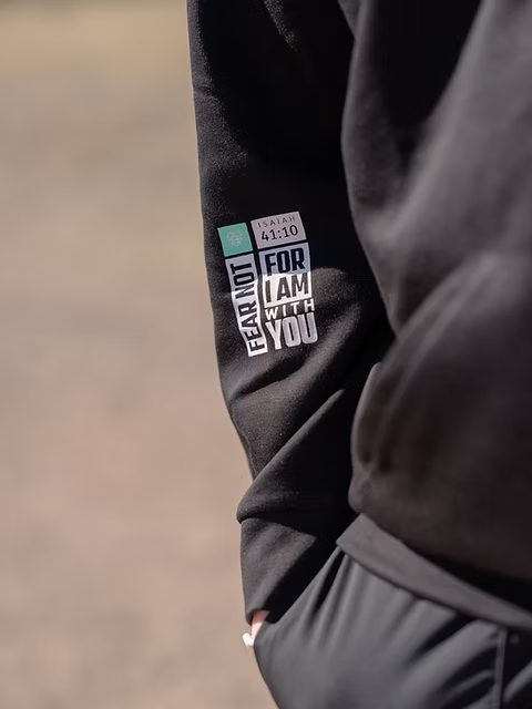Black BCOMFY hoodie sleeve with Isaiah 41:10 Fear Not For I Am With You graphic